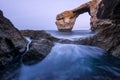 A beautiful early morning landscape photograph of the famous Azure Window rock arch