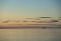 Beautiful early morning view of alone sea truck ferry ship in Irish Sea seen from Blackrock Beach, Dublin, Ireland Royalty Free Stock Photo