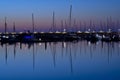 Beautiful early morning view of boats and yachts in West Pier of famous Dun Laoghaire harbor during the blue hour before sunrise Royalty Free Stock Photo
