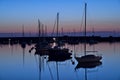 Beautiful early morning view of boats and yachts in West Pier of famous Dun Laoghaire harbor during the blue hour before sunrise Royalty Free Stock Photo