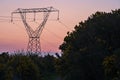 Beautiful early morning view of power lines with electricity transmission pylon against epic purple sunrise sky, Ticknock, Dublin Royalty Free Stock Photo