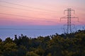 Beautiful early morning view of power lines with electricity transmission pylon against epic purple sunrise sky, Ticknock, Dublin Royalty Free Stock Photo