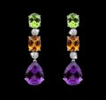 Beautiful Earrings with colorful gems Royalty Free Stock Photo
