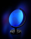 Beautiful Easter blue egg on support on a dark background Royalty Free Stock Photo