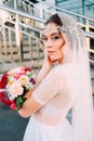 Beautiful eastern style bride with white veil and hairpiece Royalty Free Stock Photo