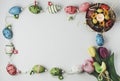 Beautiful Eastern style flat lay with traditional painted eggs and tulips