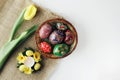 Beautiful Eastern style flat lay with traditional painted eggs and tulips