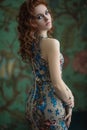 Beautiful effectual red-haired girl. Red Hair. Fashion Girl Portrait .