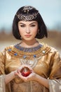 Beautiful Egyptian woman like Cleopatra outdoor