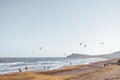 Beach with kite surfers on a sunset Royalty Free Stock Photo