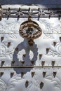 Beautiful elaborated doorknocker of San Bartolome church in Javea