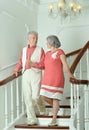 Beautiful elderly couple on stairs