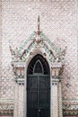 Artisan ceramic facade and gate of Bangkok Grand Palace building