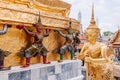 Golden and coloured giant guardian statue of Bangkok Grand Palace building - Wat Phra Kaew