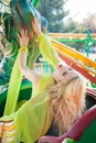 Beautiful elegant blonde fashion woman portrait in amusement park summer Royalty Free Stock Photo