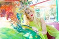 Beautiful elegant blonde fashion woman portrait in amusement park summer Royalty Free Stock Photo