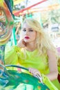 Beautiful elegant blonde fashion woman portrait in amusement park summer Royalty Free Stock Photo