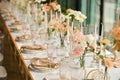 beautiful elegant decor of flowers and elegant serving on the wedding table. Royalty Free Stock Photo