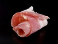 A beautiful elegant transparent piece of bacon on a glossy black background Royalty Free Stock Photo