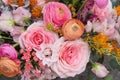 Beautiful elegant wedding pink orange bouquet with roses flowers close up. Floral background Royalty Free Stock Photo