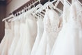 Beautiful elegant white luxury bridal dress on hangers. Generative AI