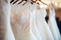 Beautiful elegant white luxury bridal dress on hangers. Generative AI