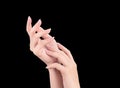 Beautiful and elegant woman hands isolated on black background, concept of applying moisturizing cream and body care, closeup Royalty Free Stock Photo