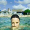 Beautiful elegant woman in the sea Royalty Free Stock Photo