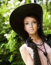 Beautiful elegant young lady enjoying a day in the park Royalty Free Stock Photo