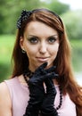 Beautiful elegant young lady enjoying a day in the park Royalty Free Stock Photo