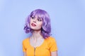 Beautiful and emotional model purple hair isolated background Royalty Free Stock Photo