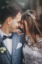 Beautiful emotional wedding couple laughing and hugging in european city. Provence wedding. Stylish happy bride and groom smiling Royalty Free Stock Photo