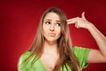 Beautiful emotional woman over red background Royalty Free Stock Photo