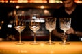 Beautiful empty crystal glasses for wine on bar counter Royalty Free Stock Photo