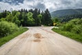 Beautiful empty macadam road with crossroads, in cerknica, Slovenia