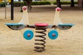 Beautiful empty park for children with a colorful small playground on the sand Royalty Free Stock Photo