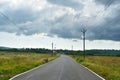 Beautiful Empty road in Autumn season with green fields and cloudy sky in Goa Royalty Free Stock Photo