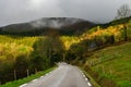 Beautiful empty road in Pyrenees. Autumn sunrise, shadows and co Royalty Free Stock Photo