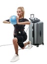 Beautiful EMS fitness woman doing lunge exercise with ball Royalty Free Stock Photo