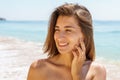 Beautiful Engaged Young Woman Portrait With Engagement Diamond Ring Feeling Happy On Beach