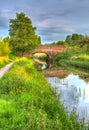 Beautiful English river and bridge on calm still day in colourful HDR Royalty Free Stock Photo