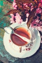 Beautiful, English, vintage teacup with Japanese cherry tree blossoms