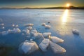 Beautiful epic ice crystal in the frozen bay. Sun rays reflection Royalty Free Stock Photo