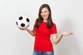 Beautiful European young people, football fan or player on white background. Sport, play, health, healthy lifestyle concept. Royalty Free Stock Photo