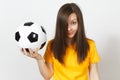 Beautiful European young people, football fan or player on white background. Sport, play, health, healthy lifestyle concept. Royalty Free Stock Photo