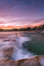 Beautiful evening Bondi Beach with a cityscape in the background at sunset at Syndey, Australia