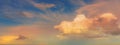 Beautiful evening cumulus clouds golden with pink blue sky Royalty Free Stock Photo