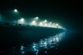 A beautiful evening fog above the river in city centre. Bridge in the mist, autumn scenery. Soft, blurry, misty look. Colorful, my Royalty Free Stock Photo