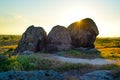 Beautiful Evening Landscape with Rocks in the Field at Sunset Royalty Free Stock Photo