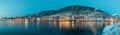 Beautiful evening panorama of Bergen waterfront, Bryggen area. Magical wide cityscape at night, covering the whole bay of Bergen. Royalty Free Stock Photo